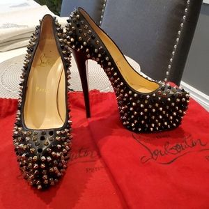 Christian louboutin black spiked pumps